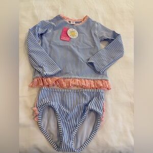 NWT Ruffle Butts long sleeve rash guard size 7. Perriwinkle Seersucker 2 piece.